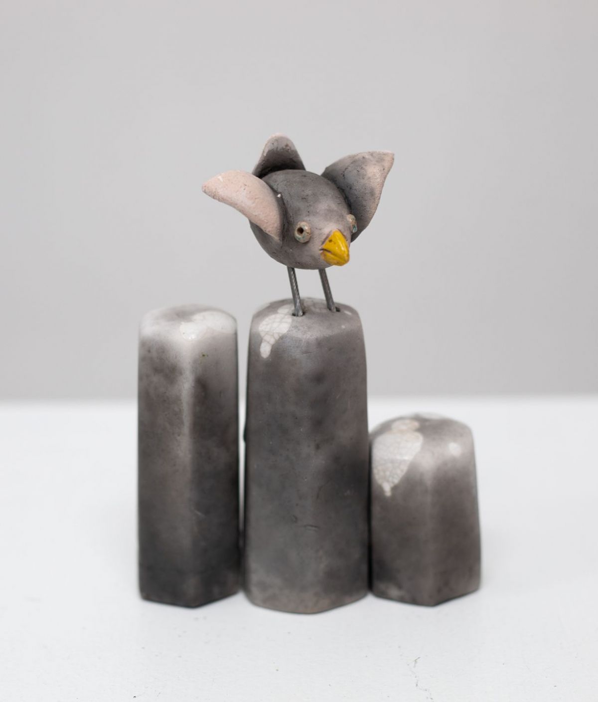 chris barnes | bird on column with wings open